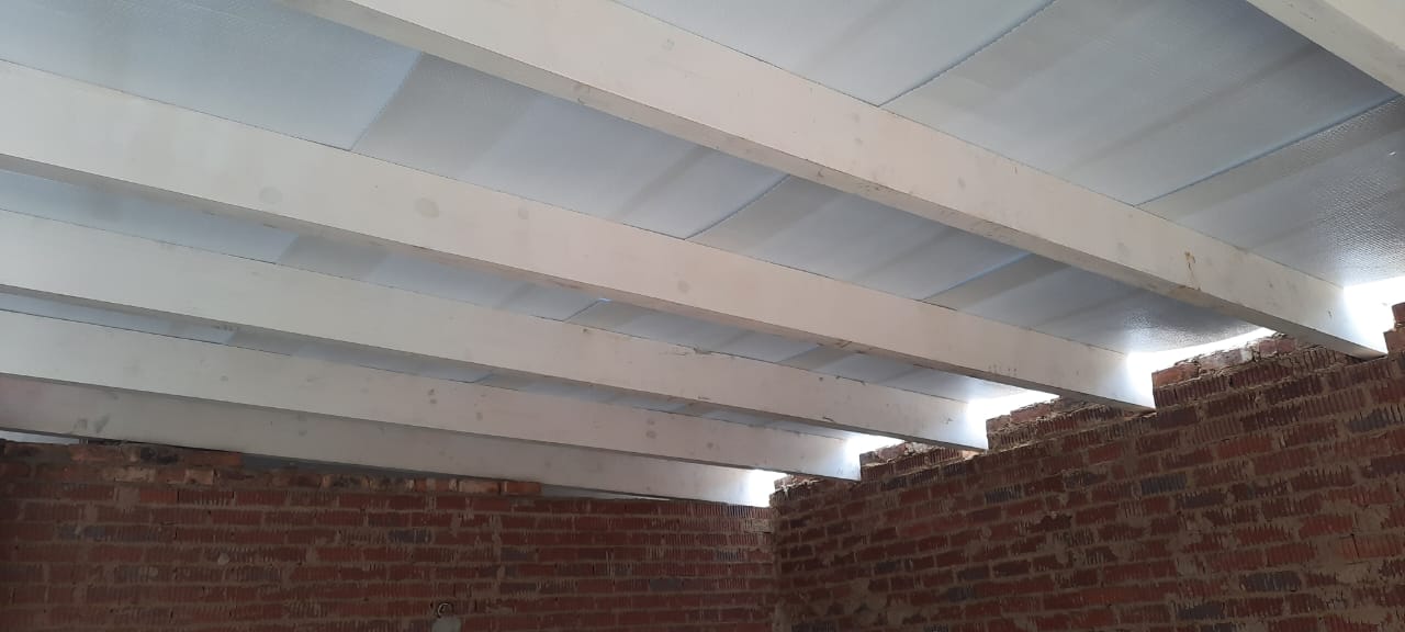 Roof insulation/cover being installed