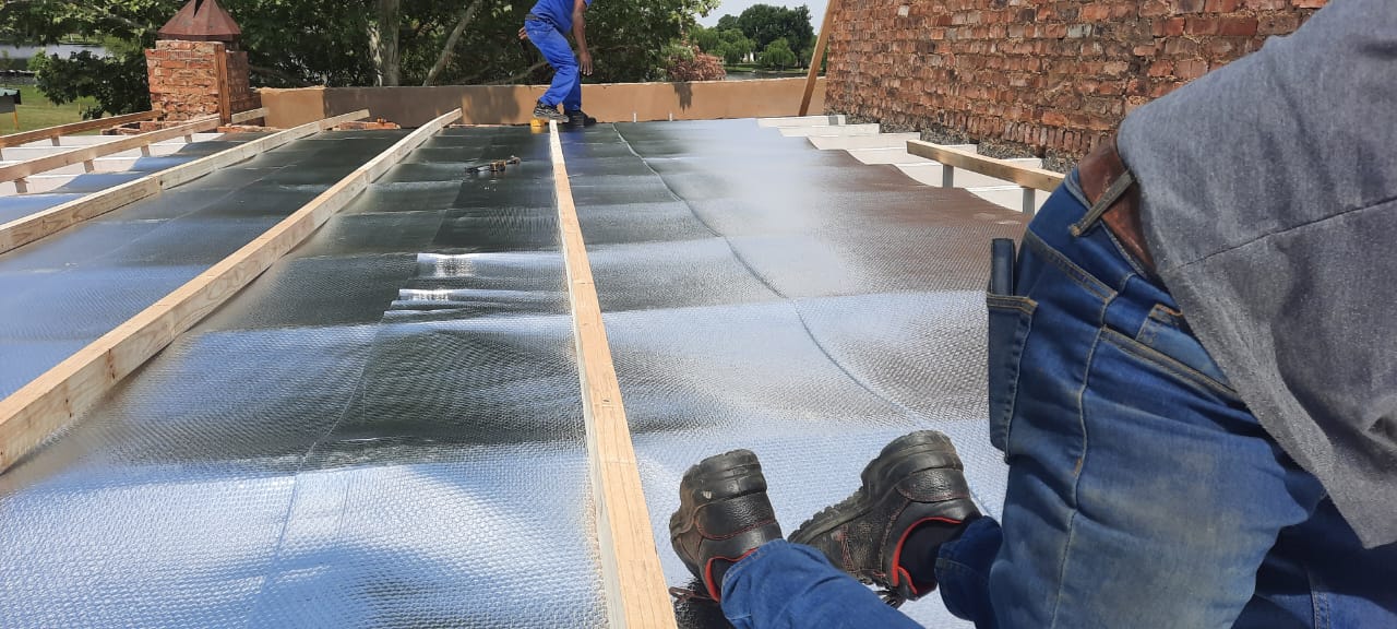 Protective layer over rafters